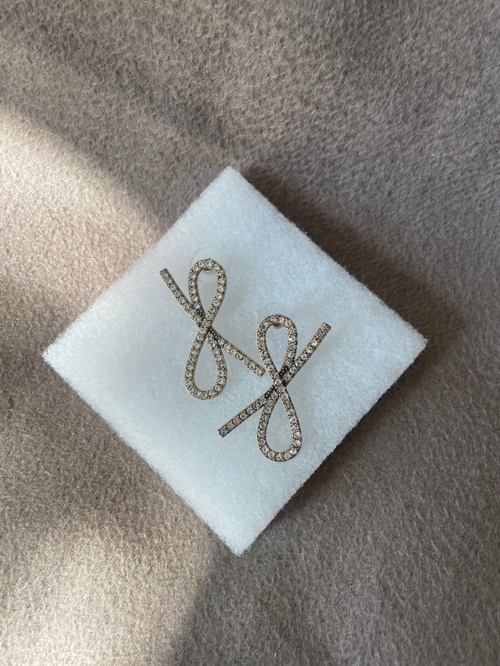 Gold tone oversized bow earrings